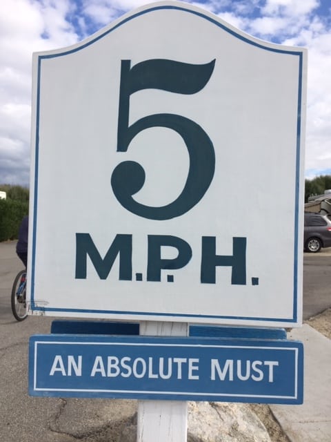 Sign in an RV park that reads, "5 mph. An absolute must."