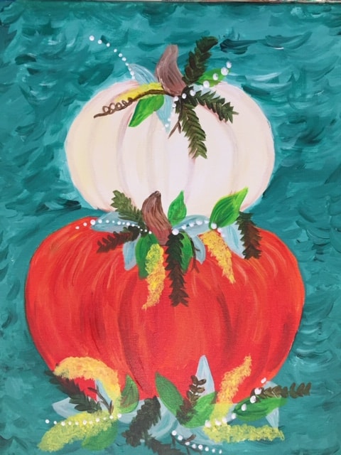 Painting with an orange pumpkin with a white pumpkin on top, with leaves, flowers and decorative items. 