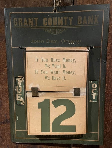 An old calendar dated Tuesday, October 12. It's from a old bank.