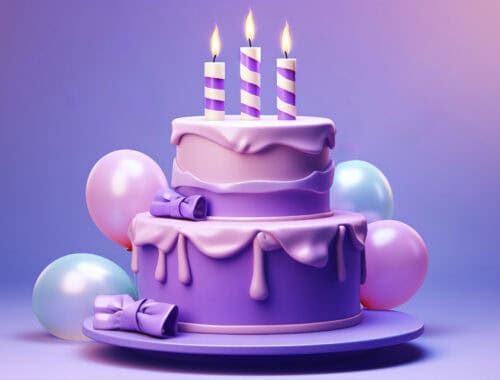 Purple birthday cake with candles and balloons